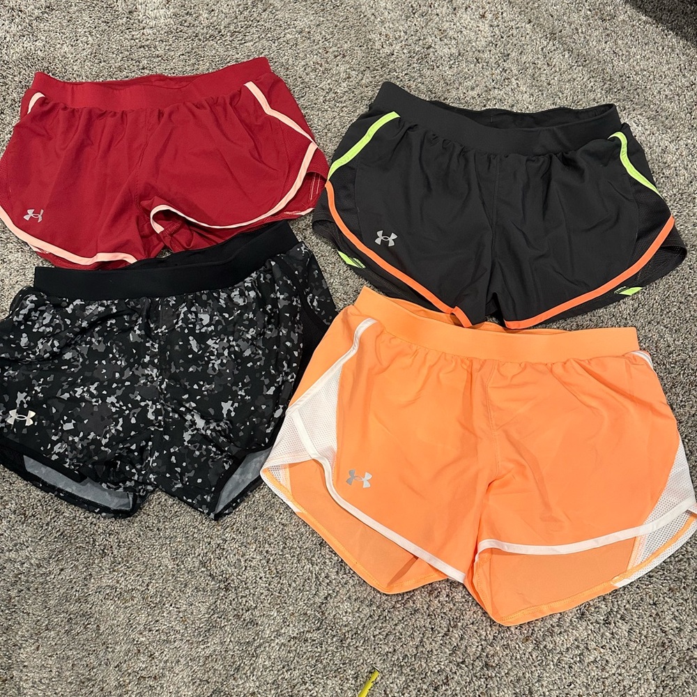 6 pairs of athletic shorts.  2 Nike shorts and 4 under armour. 
All size small.